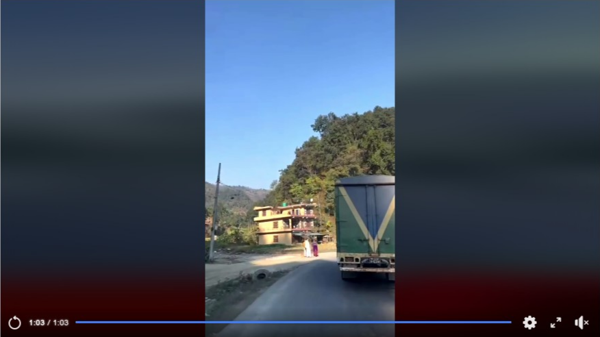 Nepal road with mountains and buildings